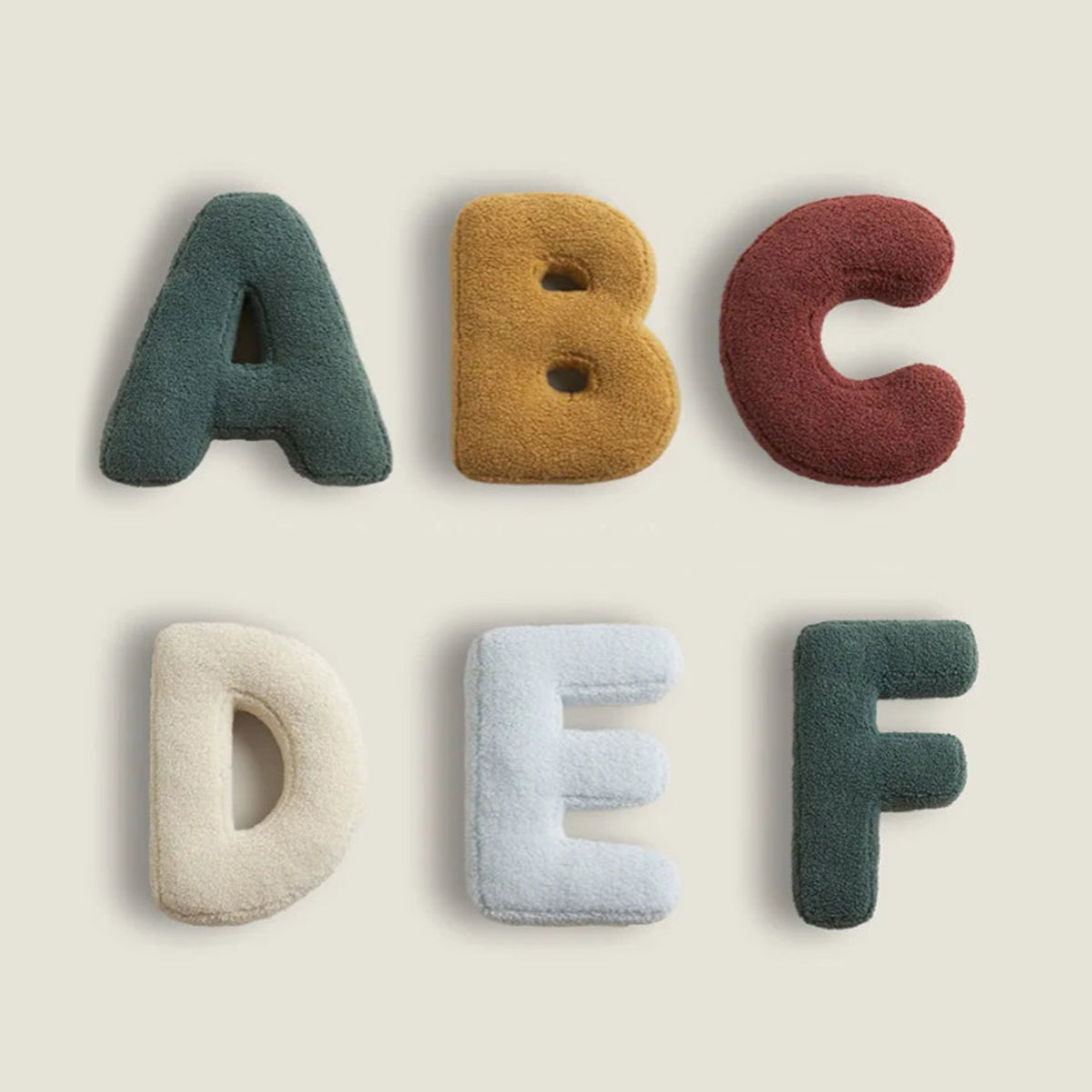 Buchstabenkissen Mino