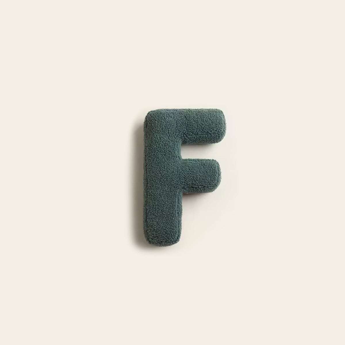 Buchstabenkissen Mino