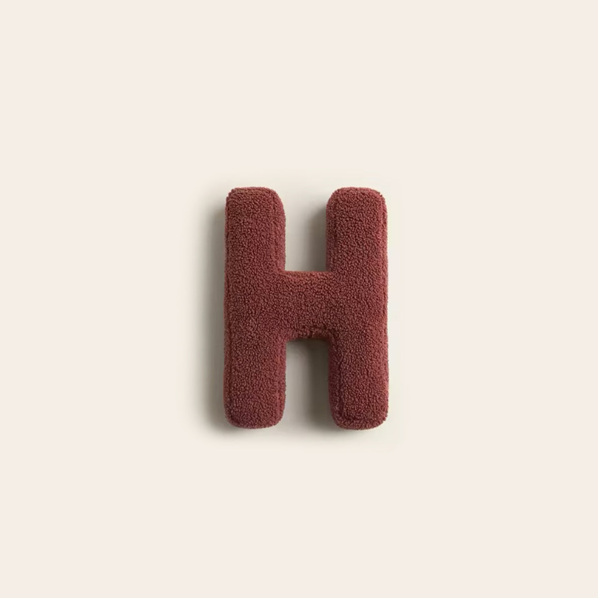 Buchstabenkissen Mino