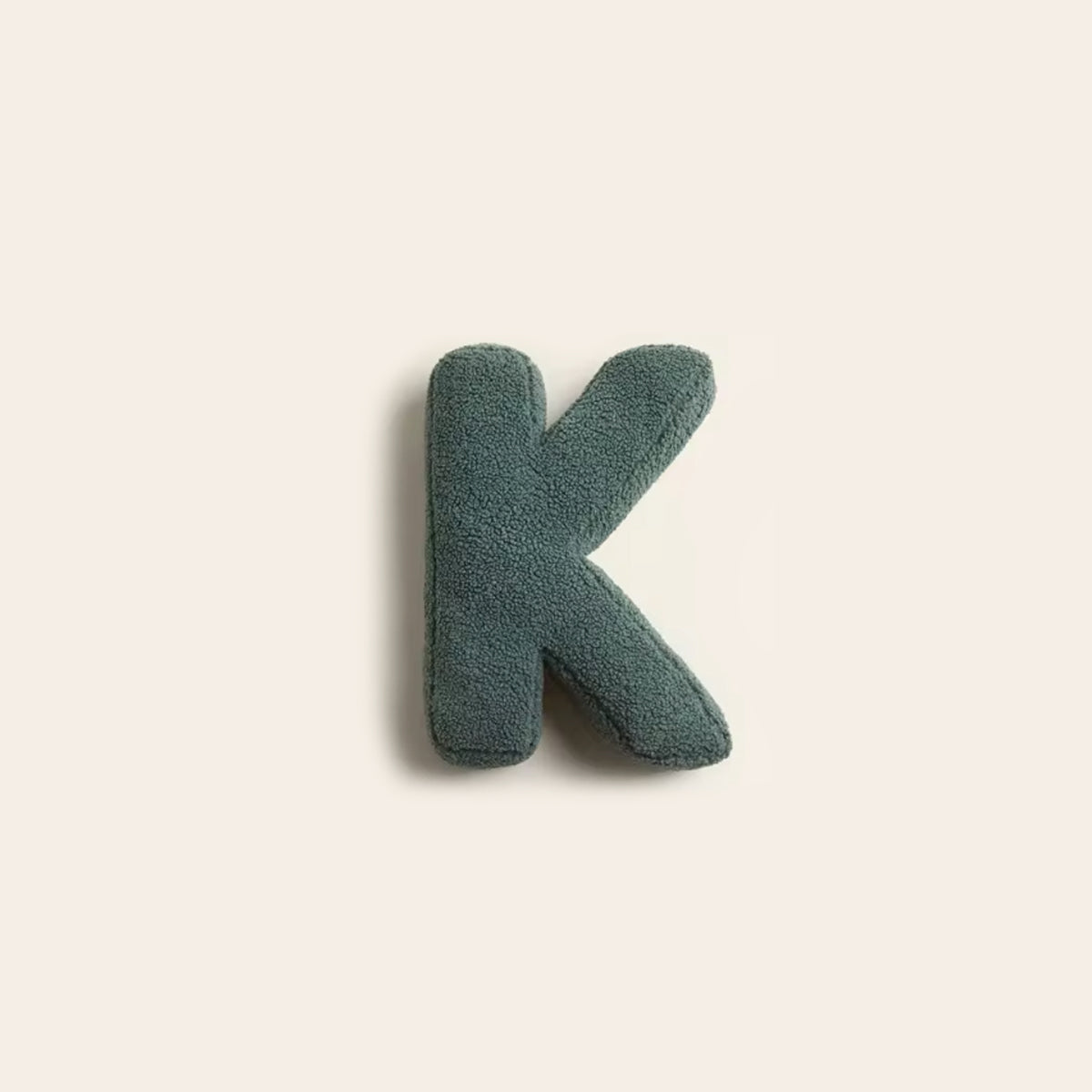 Buchstabenkissen Mino